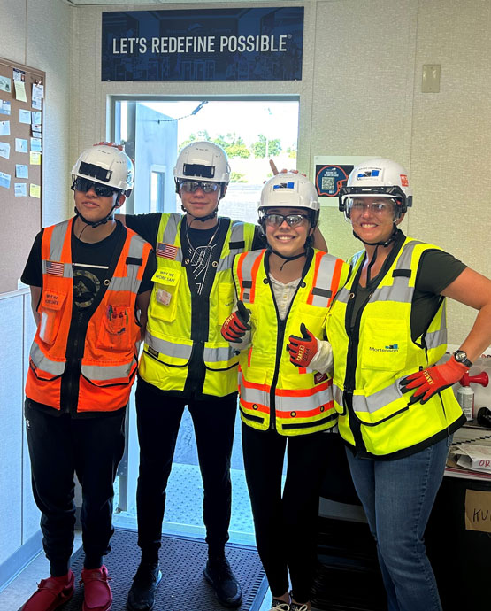 Kathy Freeman family at Denver Broncos stadium in PPE